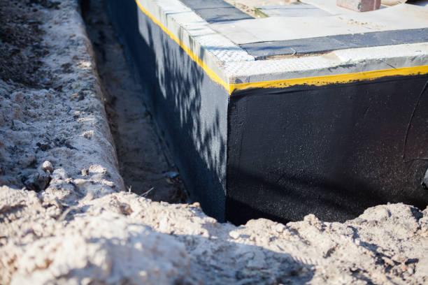 Professional Waterproofing technician working in Luckey, OH